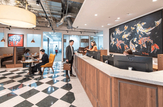 Reception team greeting client